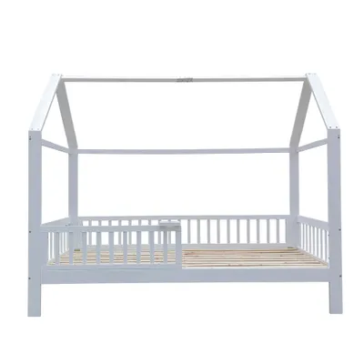 A white wooden house-shaped bed frame with a slatted base and a partial railing on one side, shown against a white background.