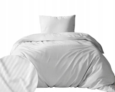 A white duvet and pillow with subtle vertical stripes, presented on a white background.