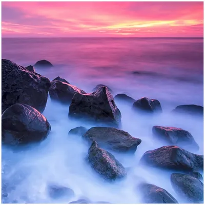 Produktbild von Wallario Memoboard Magnettafel aus Glas, Größe 50 x 50 cm, Motiv Felsen im Meer bei Sonnenuntergang