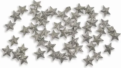 A scattering of small, glittery star-shaped confetti pieces on a white background.