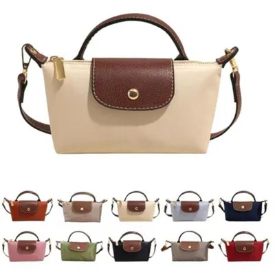 Produktbild von Mini Crossbody Tasche für Damen – Kleine Schultertasche mit verstellbarem Riemen – Reißverschlusstaschen – Leicht & langlebiges Kunstleder – für Alltag