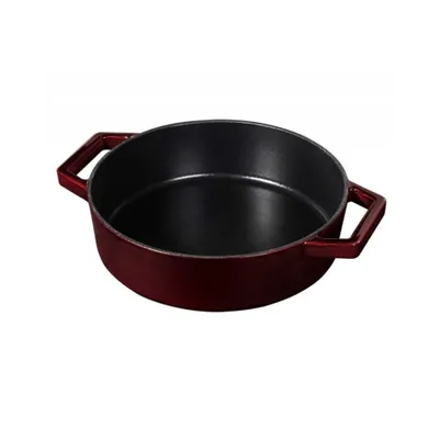 A burgundy braadpan with black interior and two handles, shown from a slightly elevated side angle on a white background.