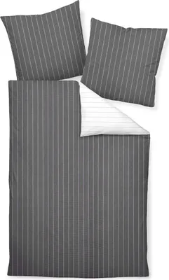 A set of bedding, including a duvet cover and two pillowcases, laid out flat on a white background.
