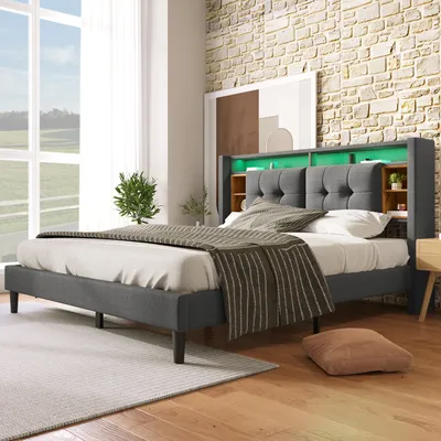 A bedroom scene with a bed, plants, and a window.