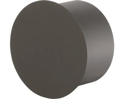 A dark gray cylindrical object, likely a chimney cap, is shown against a white background.