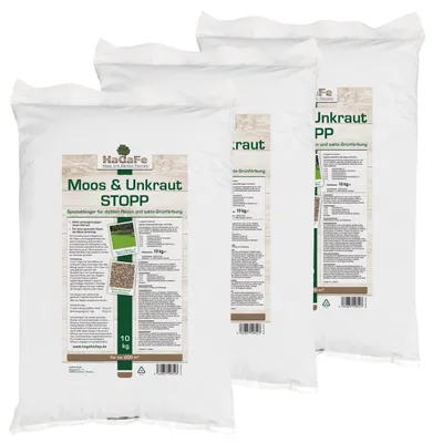 Three bags of lawn fertilizer stacked together.