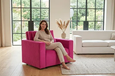 Produktbild von Schlafsessel KOMO Monolit – mit Bettkasten, Webstoff in Rosa, Family Meble, KI-generiertes Bild