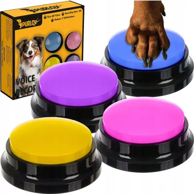 A dog's paw is pressing a blue button, with other colored buttons and packaging in the background.
