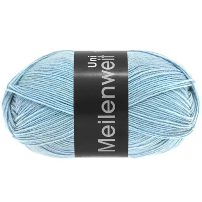 A ball of light blue yarn with a black label wrapped around it.