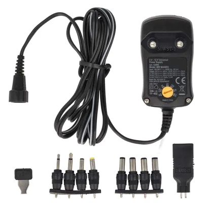 Produktbild von Schaltnetzteil stabilisiert 600mA 3V / 4,5V / 5V / 6V / 7,5V / 9V / 12V Universal Netzteil inkl. 8 Adapterstecker und USB-Buchse - Weltweit einsetzbar
