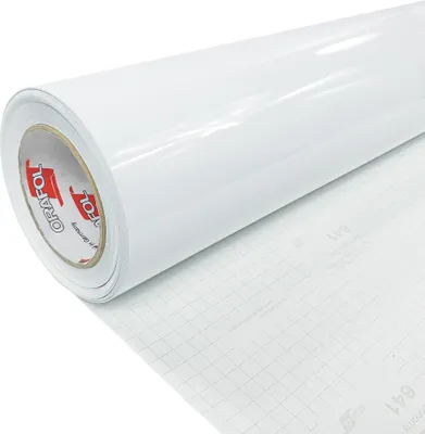 A roll of white, high-gloss adhesive film is shown diagonally against a white background. The backing paper with a grid pattern is partially visible.