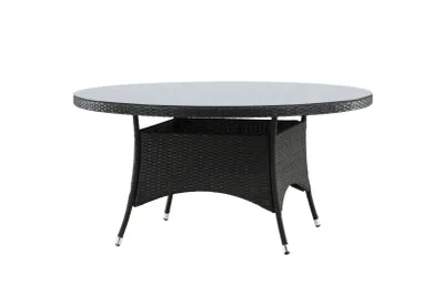 A round outdoor dining table with a glass top and a woven black base, isolated on a white background.