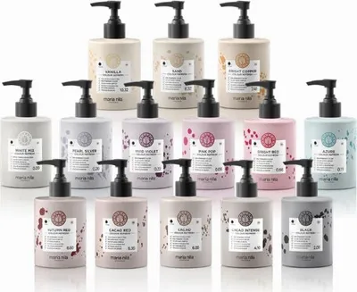 A collection of Maria Nila Colour Refresh bottles arranged in rows.