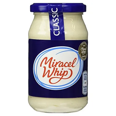 A jar of Miracel Whip salad cream on a white background.