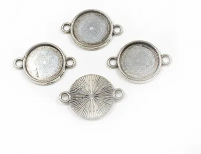 Produktbild von Vintageparts Fassungen rund Metalllegierung antik Silber Cabochon 14 mm, 4 Stück