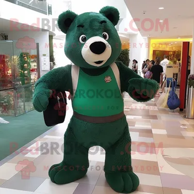 Produktbild von Maskottchen REDBROKOLY Kostümfigur Waldgrüner Bär bekleidet mit einem Tanktop und Messenger-Taschen