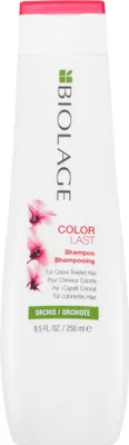A white bottle of Biolage Colorlast Shampoo with pink accents and green text.