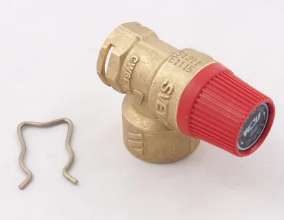 A brass safety valve with a red cap and a metal clip on a white background.