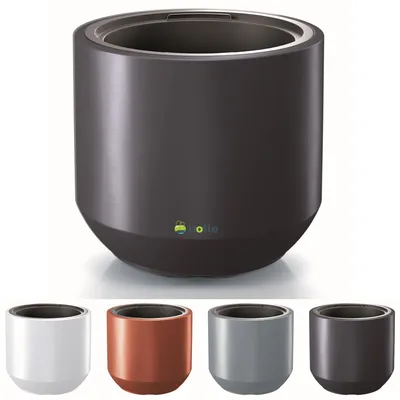 A large anthracite planter is shown in the center, with smaller versions in white, copper, and gray displayed below. The smaller planters are arranged in a row.