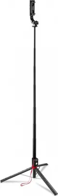 A black selfie stick tripod with a phone mount at the top, standing upright on a white background.