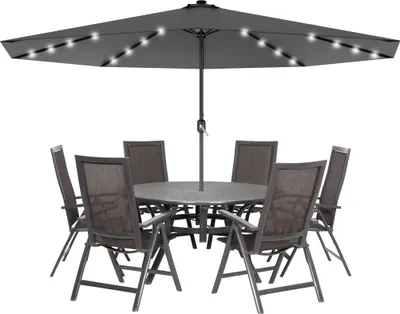A dark gray patio umbrella with LED lights and a matching table and chairs set.