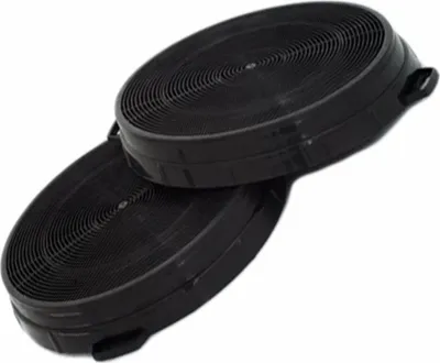 Two black circular carbon filters are stacked on top of each other against a white background.
