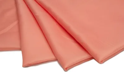 Zdjęcie produktu dla Podszewka z poliestru, lekko prześwitująca, kolor łososiowy 50 x 150 cm