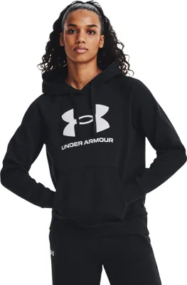 A woman wearing a black Under Armour hoodie.