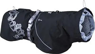 A black dog coat is laid out against a white background.