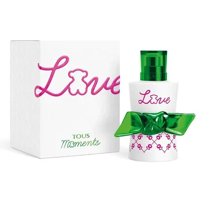 A perfume bottle and its box are displayed against a white background.