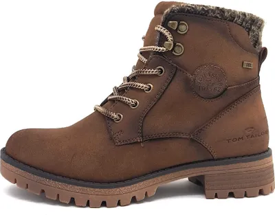 A brown leather boot on a white background.