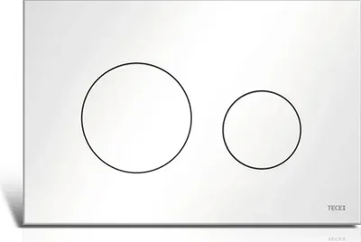 A white toilet flush plate with two circular buttons, one larger than the other, and the brand name 'TECE' at the bottom right.