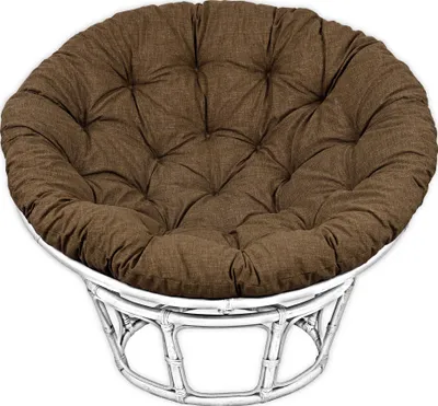 A papasan cushion on a white rattan chair.