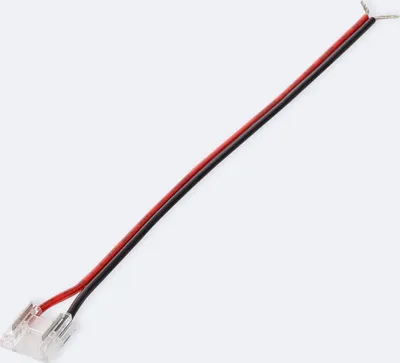 A close-up shot of an LED strip connector with wires against a white background.