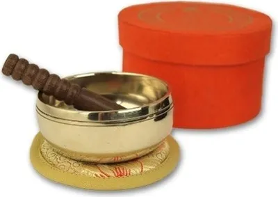 Produktbild von Kleine hochglanz Klangschale in orangefarbiger Box mit Buddha-Aufdruck