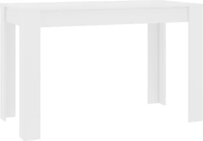 A white dining table against a white background.