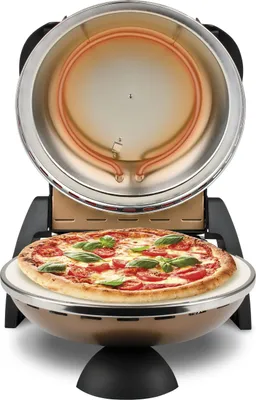 A pizza oven with a pizza inside.