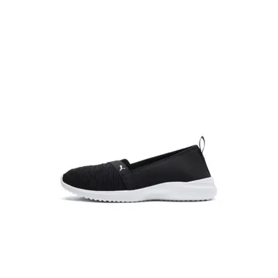 A black Puma women's slip-on shoe with a white sole, shown from the side against a white background.