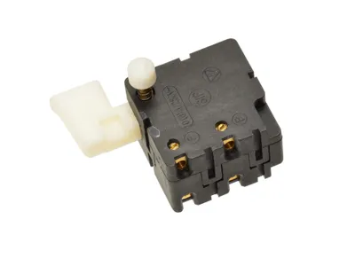 A close-up studio shot of a black and white electrical switch on a white background.