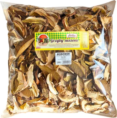 A clear, well-lit image of a large bag of dried, sliced porcini mushrooms.