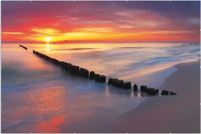 Produktbild von Wallario Wandbild Farbenspiel im Himmel - Sonnenuntergang am Strand, Größe: 61 x 91,5 cm, Poster mit rahmenlosen Bildhalter