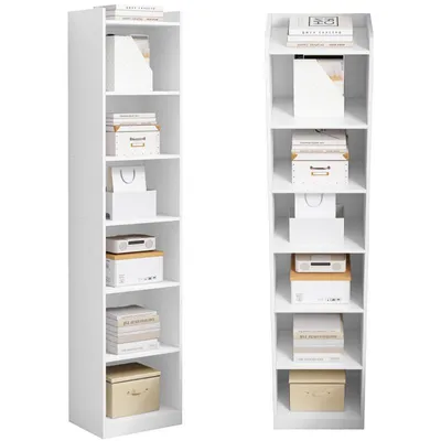 Two tall, narrow white bookshelves side-by-side, filled with books and decorative boxes.