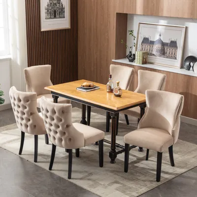A dining room set with a table and chairs.