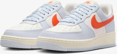 A pair of Nike Air Force 1 sneakers.