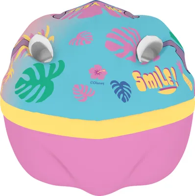 A close-up, top-down view of a colorful children's helmet with a tropical leaf and flower pattern.