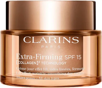 A close-up studio shot of a Clarins Extra-Firming SPF 15 day cream jar against a white background.