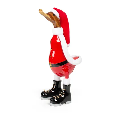 A wooden duck figurine dressed as Santa Claus.