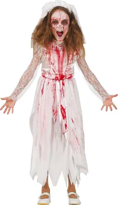 A young girl dressed in a bloody, tattered white dress and veil, styled as a ghost bride for Halloween.