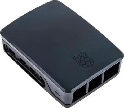 A black Raspberry Pi case with the Raspberry Pi logo embossed on the top.