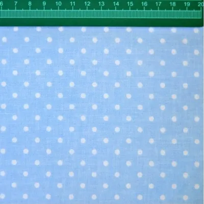 Produktbild von Baumwolle 100% Punkte 4mm weiß auf blauem Hintergrund
